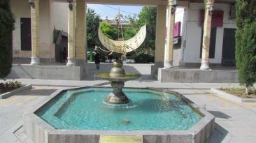 A pool and sundial in Jolfa Square