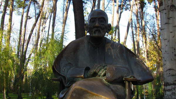 Haj Hossein Malek statue in Vakil Abad Park