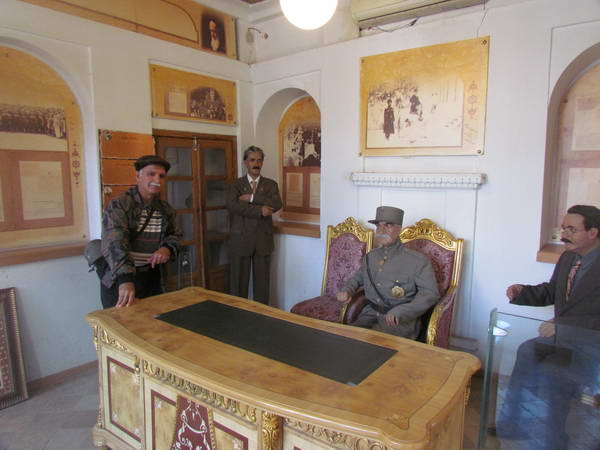 With replica of Reza Shah and his entourage in Mashrouteh House of Isfahan