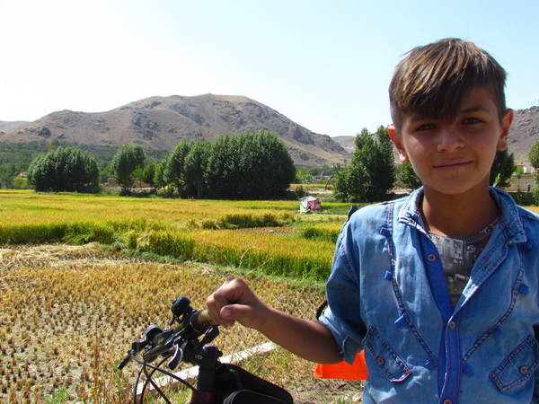 With one of the local kids, near Cham Thaq village