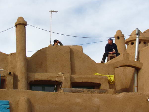 Tourists on the roof of Atashuni eco lodge in Garmeh village