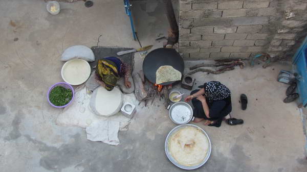 Local women baking bread - Rawar village